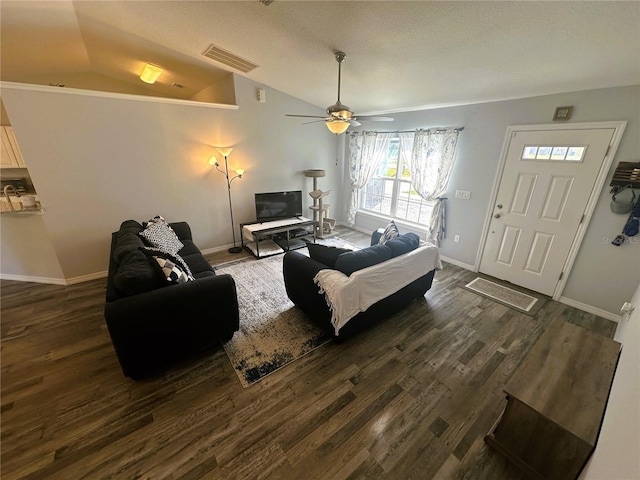 living area with lofted ceiling, baseboards, visible vents, and dark wood-style flooring