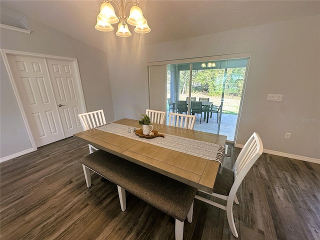 dining area with dark wood finished floors, baseboards, and an inviting chandelier