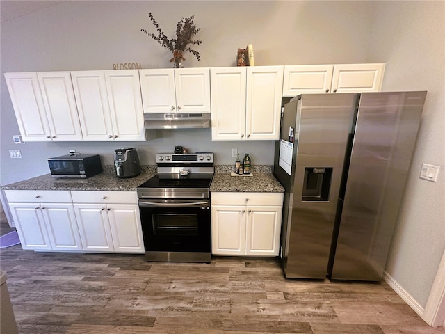 kitchen with stainless steel appliances, white cabinetry, and under cabinet range hood