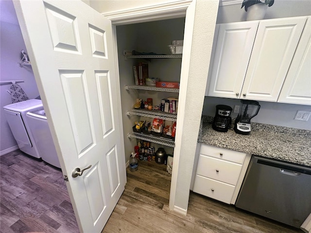 pantry featuring separate washer and dryer