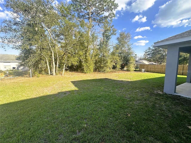 view of yard featuring fence