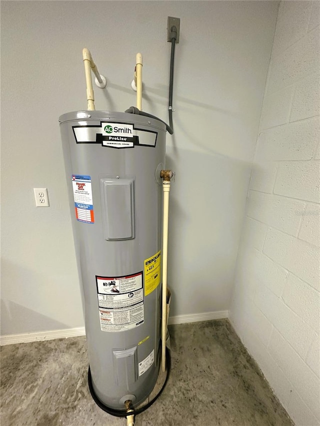 utility room with electric water heater