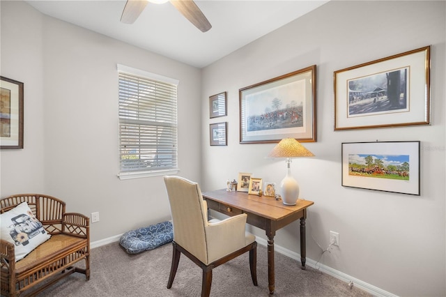 office with carpet floors, ceiling fan, and baseboards