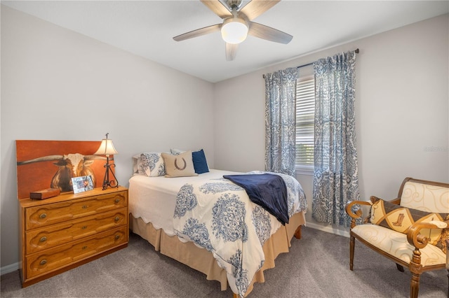 bedroom featuring baseboards, a ceiling fan, and carpet flooring