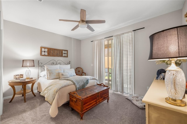 carpeted bedroom with ceiling fan and baseboards