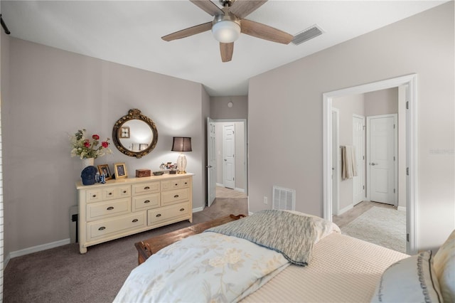 bedroom with light carpet, baseboards, visible vents, and a ceiling fan