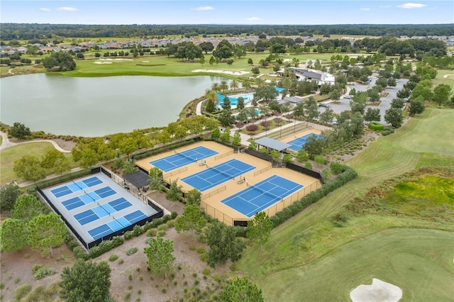 aerial view featuring golf course view and a water view