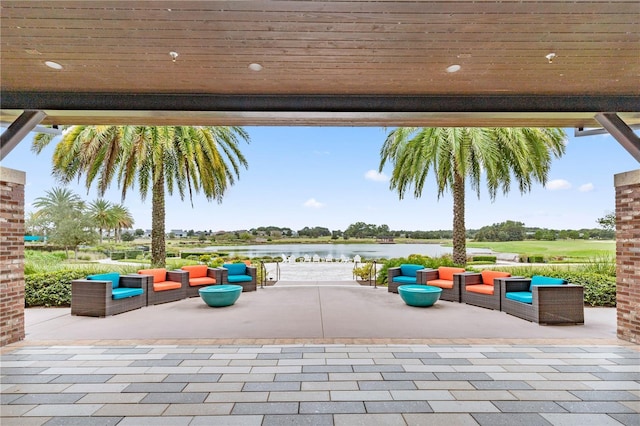 view of patio featuring a water view