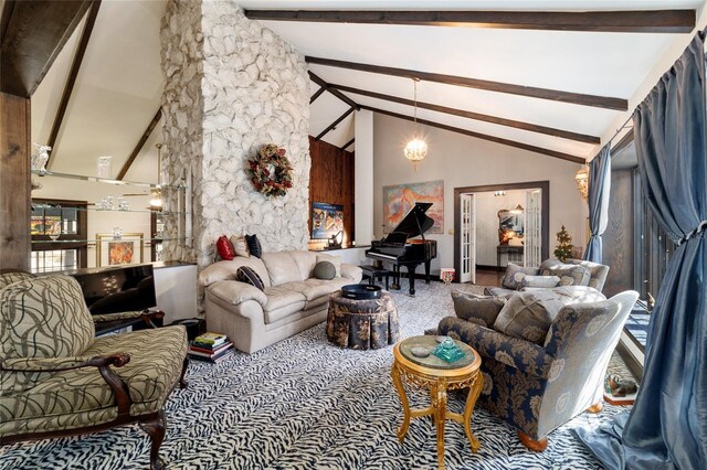 living area featuring high vaulted ceiling and beamed ceiling