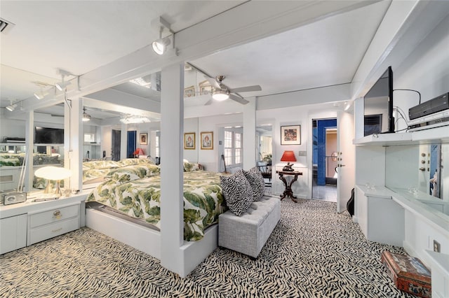 bedroom with visible vents and a ceiling fan