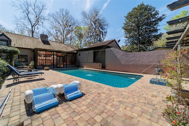 pool with a patio