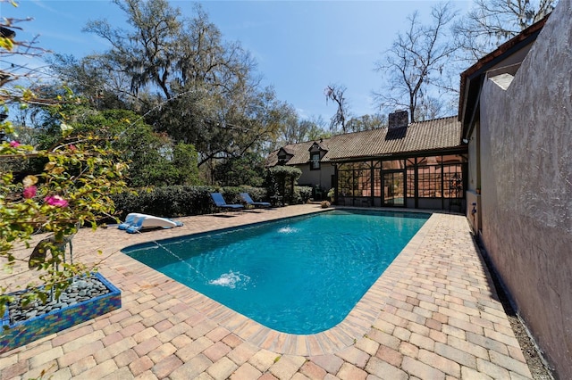 view of pool featuring a patio and a fenced in pool