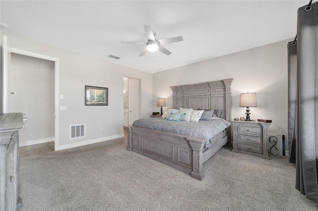 bedroom with baseboards, visible vents, ceiling fan, and carpet flooring