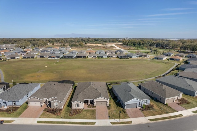 birds eye view of property with a residential view