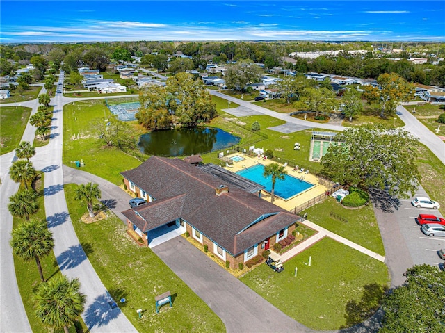 bird's eye view with a water view