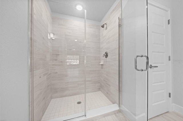 full bathroom featuring a stall shower