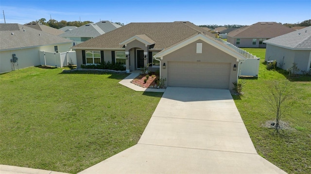 single story home featuring concrete driveway, a gate, fence, a front yard, and stucco siding