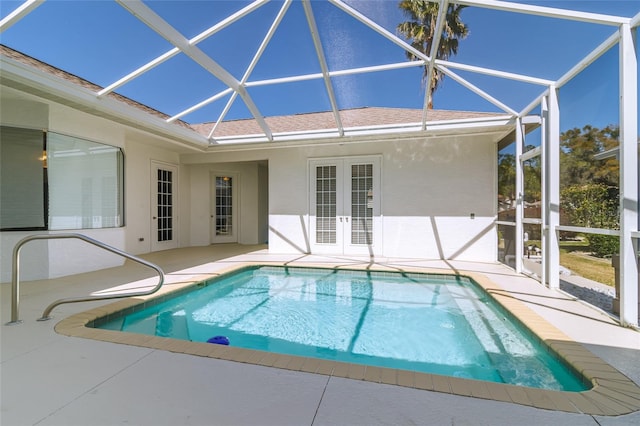 pool featuring a lanai, a patio, and french doors