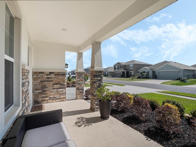 view of patio with a residential view