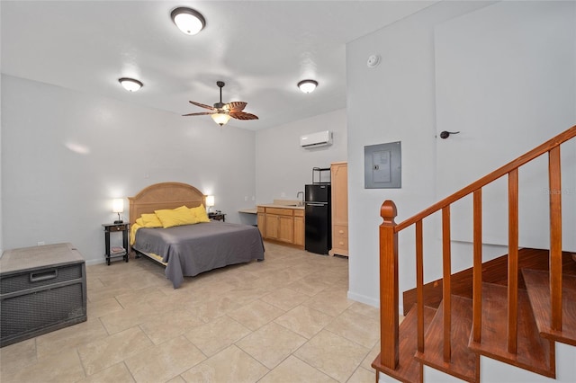 bedroom with freestanding refrigerator, an AC wall unit, a sink, electric panel, and baseboards