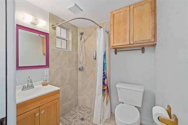 bathroom with visible vents, tiled shower, toilet, tile patterned floors, and vanity