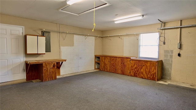 interior space featuring concrete block wall