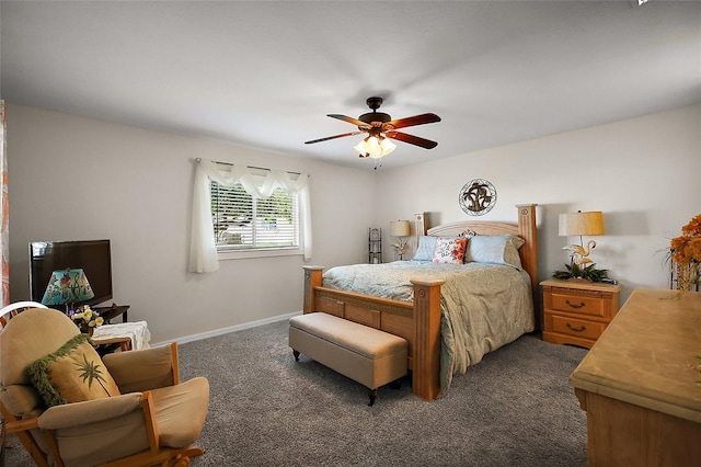 bedroom with ceiling fan, carpet flooring, and baseboards