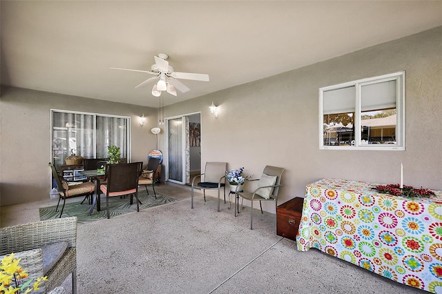 view of patio / terrace with outdoor dining area and a ceiling fan