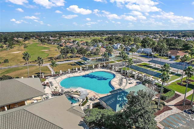 community pool featuring a patio area