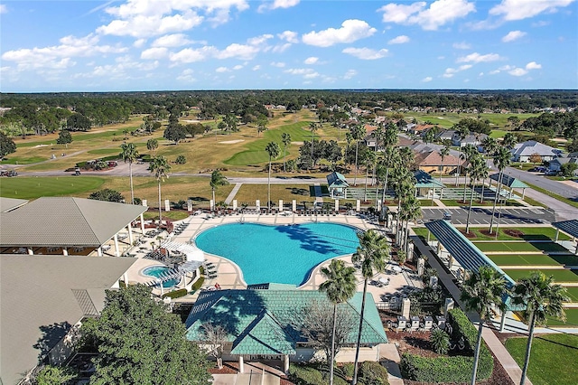 pool featuring golf course view and a patio