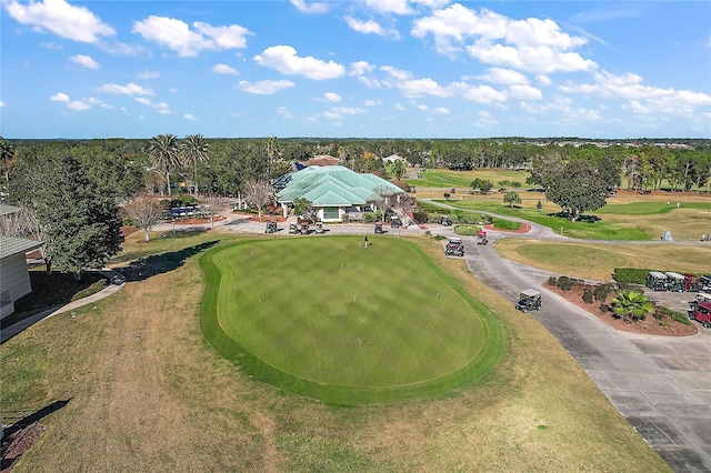 birds eye view of property featuring view of golf course