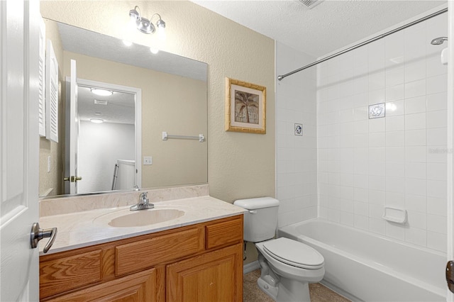 full bath featuring a textured wall, toilet, a textured ceiling, vanity, and shower / washtub combination