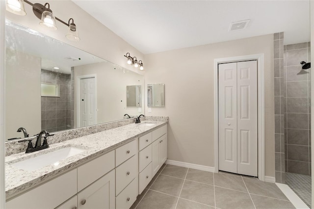 114 Bay Dr, Ocklawaha, FL 32179 - full bath featuring walk in shower, double vanity, tile patterned flooring, and a closet