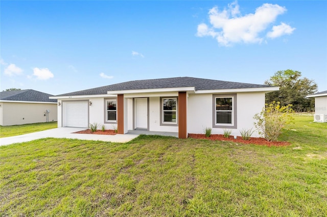 ranch-style house featuring a garage, a front yard, concrete driveway, and stucco siding