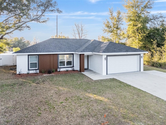 single story home featuring a shingled roof, concrete driveway, an attached garage, fence, and a front lawn