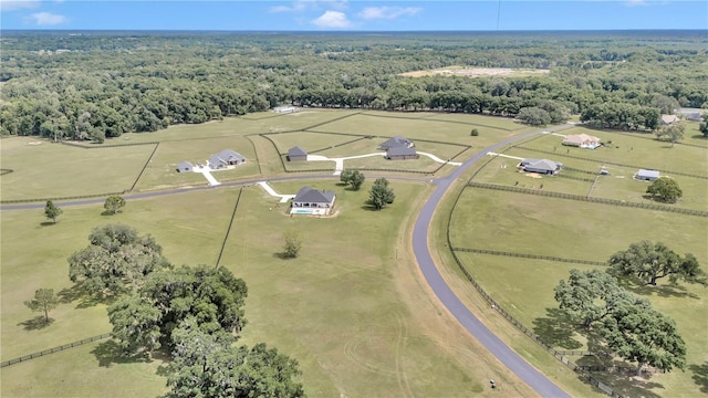 drone / aerial view with a rural view and a view of trees