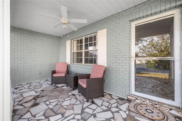 view of patio featuring a ceiling fan