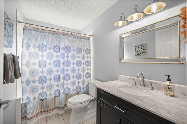 bathroom featuring toilet, curtained shower, tile patterned flooring, a textured ceiling, and vanity