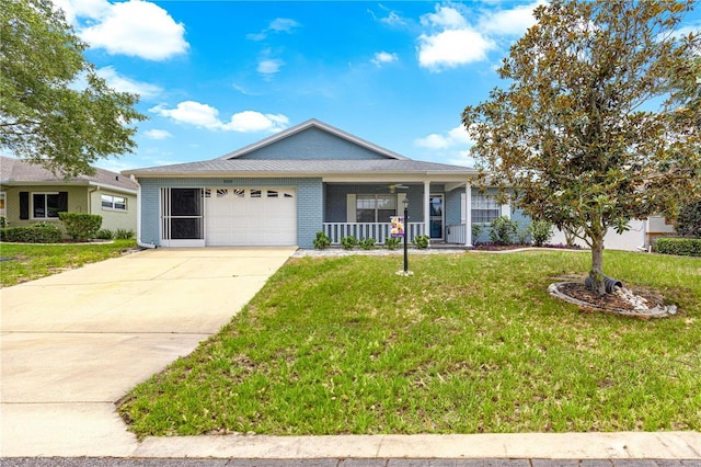 9770 SW 97th Pl, Ocala, FL 34481 - single story home with a garage, a front yard, concrete driveway, a porch, and brick siding