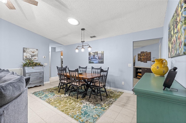 9770 SW 97th Pl, Ocala, FL 34481 - dining room featuring light tile patterned floors, a textured ceiling, and ceiling fan