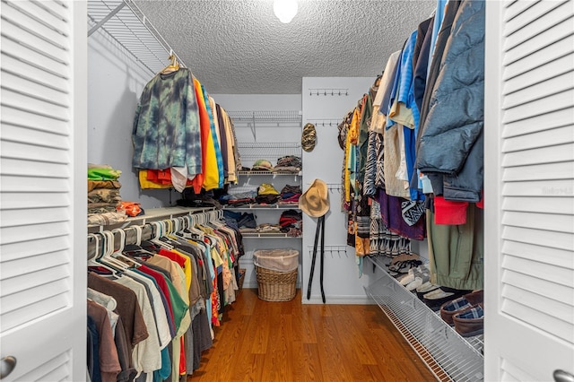 9770 SW 97th Pl, Ocala, FL 34481 - walk in closet with wood finished floors