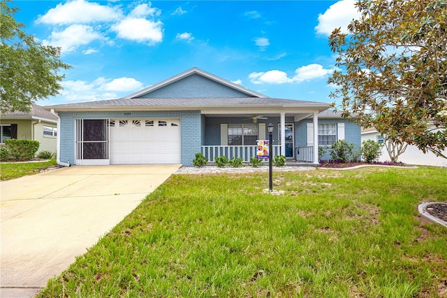 9770 SW 97th Pl, Ocala, FL 34481 - single story home featuring covered porch, a front lawn, driveway, a garage, and brick siding