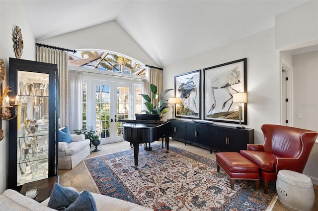 living area with carpet floors, french doors, and high vaulted ceiling