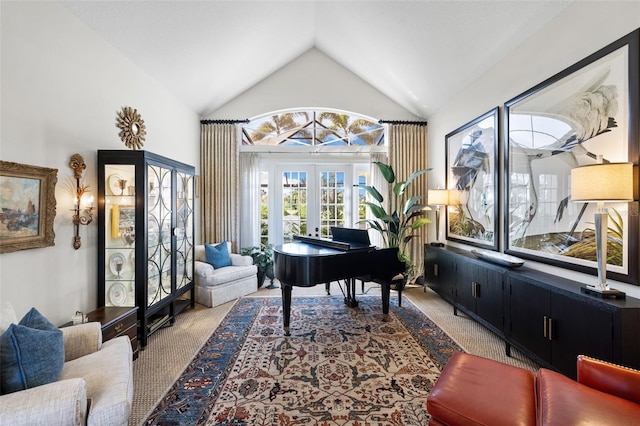 living area featuring carpet floors, high vaulted ceiling, and french doors