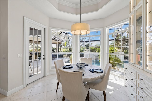 sunroom / solarium with a wealth of natural light and a raised ceiling