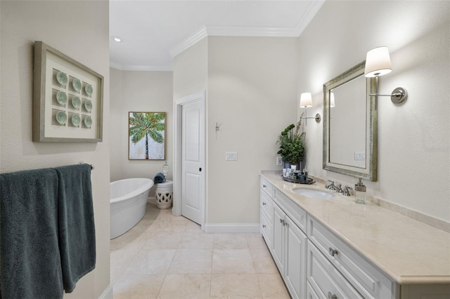 bathroom with a freestanding bath, baseboards, crown molding, and vanity