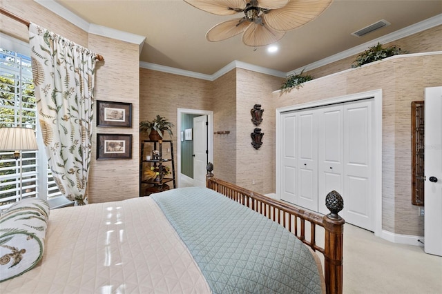 bedroom with carpet floors, visible vents, crown molding, and baseboards