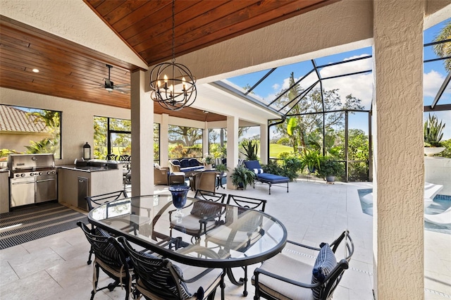 view of patio featuring an outdoor kitchen, a lanai, a grill, an outdoor pool, and outdoor dining space