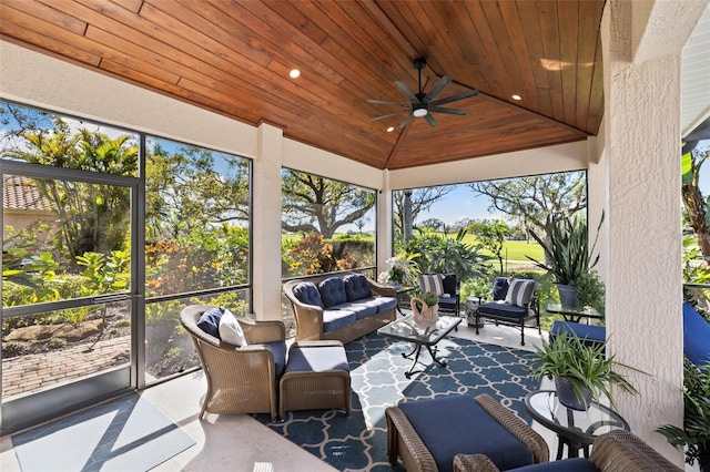 exterior space with lofted ceiling, wooden ceiling, and ceiling fan