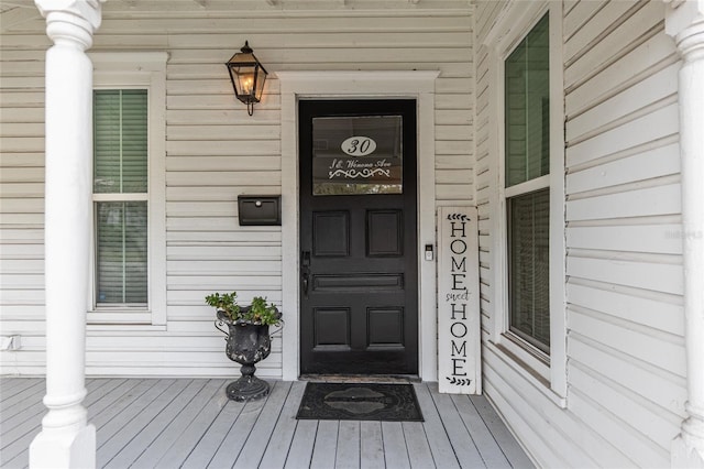 entrance to property with covered porch